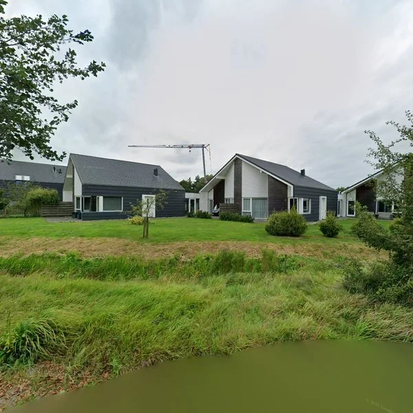 Straatbeeld van Ambachtsloane 1b, 9221RA Rottevalle
