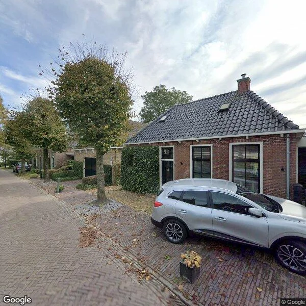 Straatbeeld van Buorren 10, 9032XC Blessum