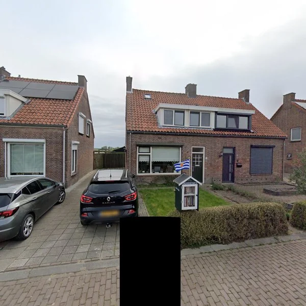 Straatbeeld van Burgemeester Vogelaarstraat 14, 4435AS Baarland