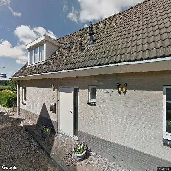 Straatbeeld van De Dam 1, 6673AE Andelst