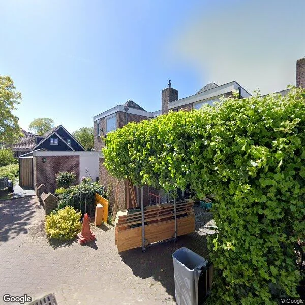 Straatbeeld van Dorpsplein 1, 2065AL Haarlemmerliede
