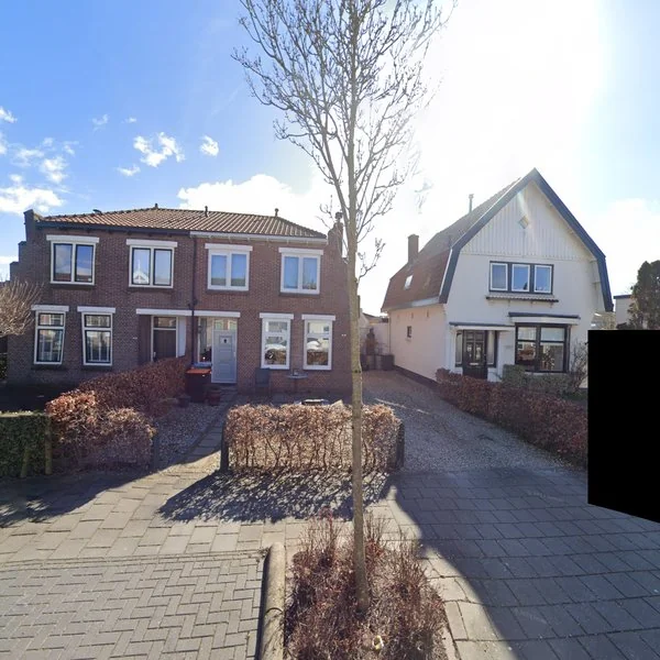 Straatbeeld van Dorpsstraat 1027, 1566JD Assendelft