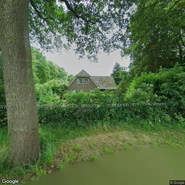 Straatbeeld van Dorpsstraat 27, 9699PA Vriescheloo