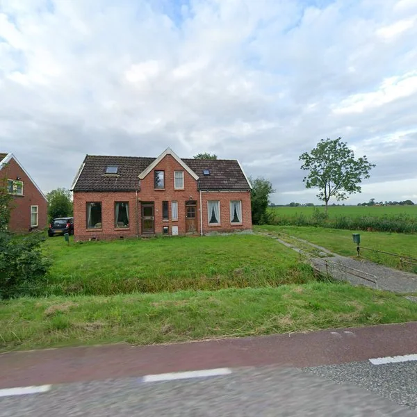 Straatbeeld van Dorpsstraat 47, 9811TA Enumatil