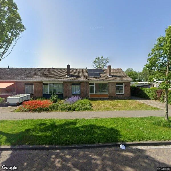 Straatbeeld van Ds. van Velzenstrjitte 15, 9289JB Drogeham