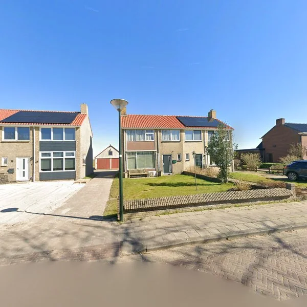 Straatbeeld van Friesmawei 15, 9007SE Idaerd