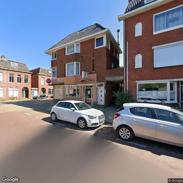 Straatbeeld van Helper Weststraat 2-1, 9721BP Groningen