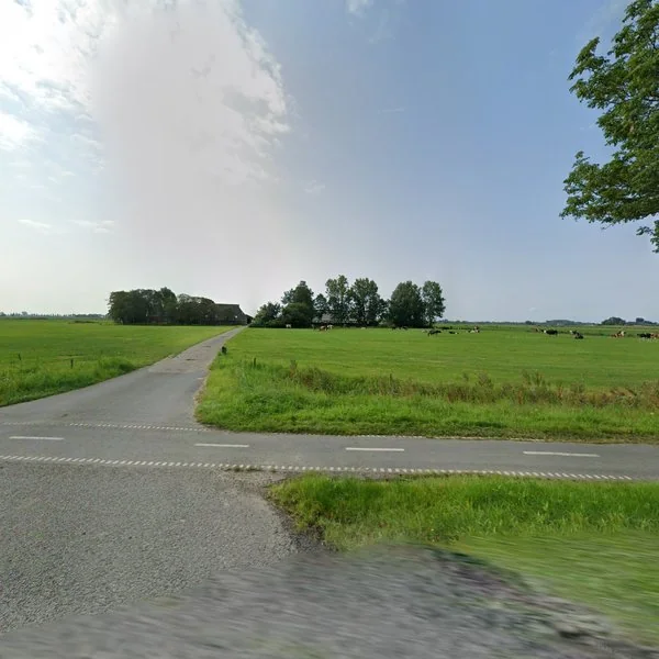 Straatbeeld van Hoofdstraat 104, 9842PJ Niezijl