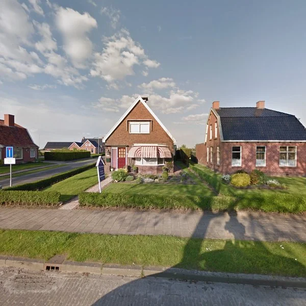 Straatbeeld van Hoofdstraat 112, 9915PH 't Zandt