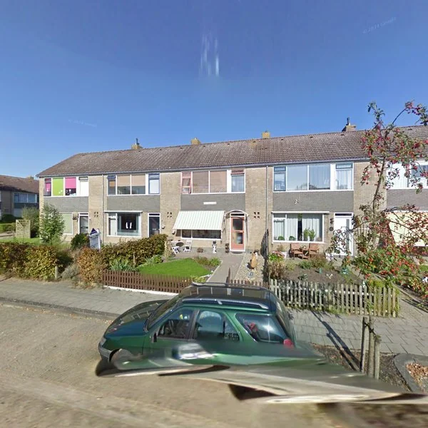 Straatbeeld van Kerkstraat 10, 9853PR Munnekezijl