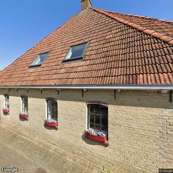 Straatbeeld van Kerkstraat 19, 8765LK Tjerkwerd