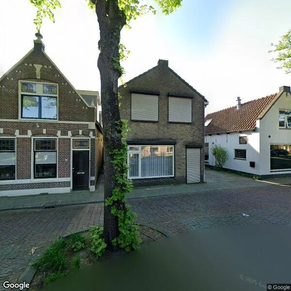 Straatbeeld van Koninginneweg 61, 3261CB Oud-Beijerland