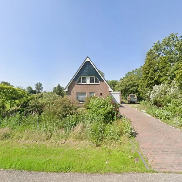 Straatbeeld van Leeuwarderweg 23, 8505AA Snikzwaag
