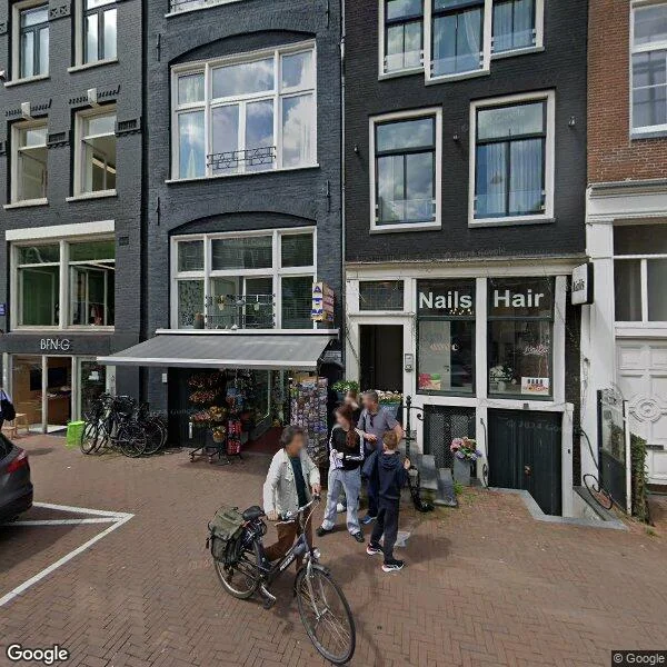 Straatbeeld van Nieuwezijds Voorburgwal 140-2, 1012SH Amsterdam
