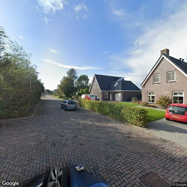 Straatbeeld van Notaris Hellemastrjitte 1, 9104JS Damwâld