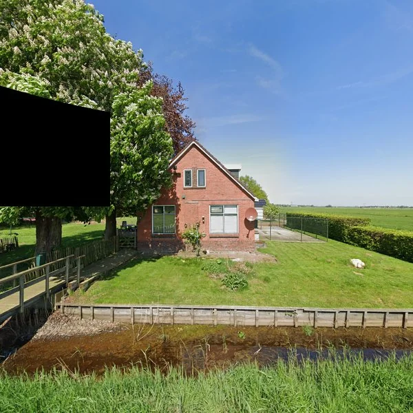 Straatbeeld van Oosterpaauwenweg 4, 9625TE Overschild