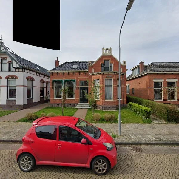 Straatbeeld van Oosterstationsstraat 11, 9981CE Uithuizen
