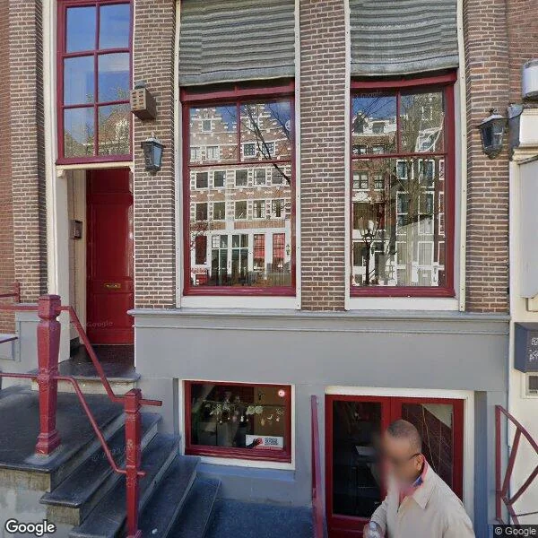 Straatbeeld van Oudezijds Achterburgwal 49B, 1012DB Amsterdam