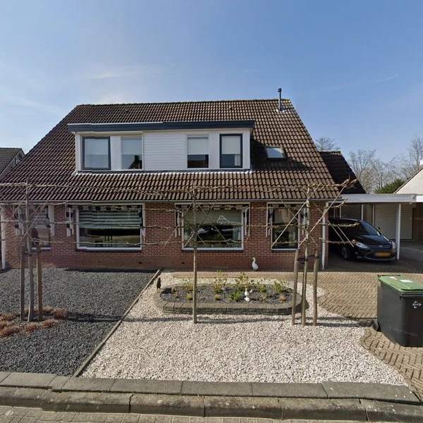 Straatbeeld van Pastoor J. van Hovestraat 33, 4153XT Beesd