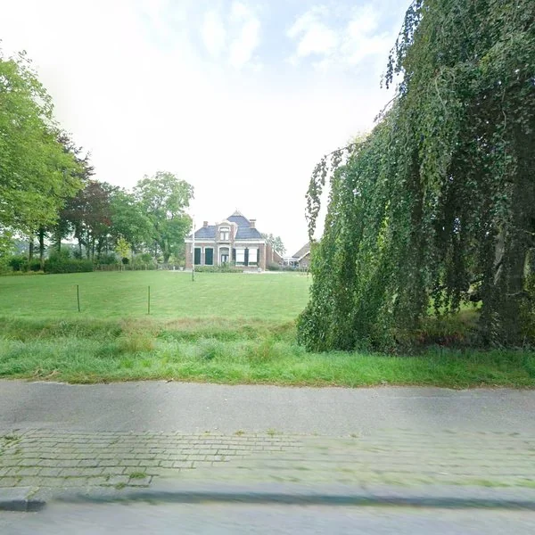 Straatbeeld van Provincialeweg 115, 9865AD Opende