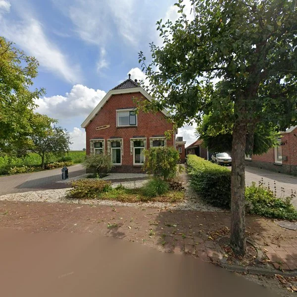 Straatbeeld van Stadsweg 68, 9885PC Lauwerzijl