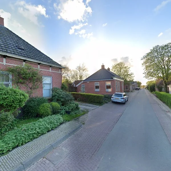 Straatbeeld van Torenstraat 13, 9992TZ Huizinge