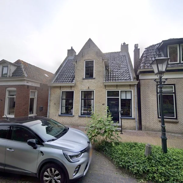 Straatbeeld van Tsjerkebuorren 42, 9035BB Dronryp