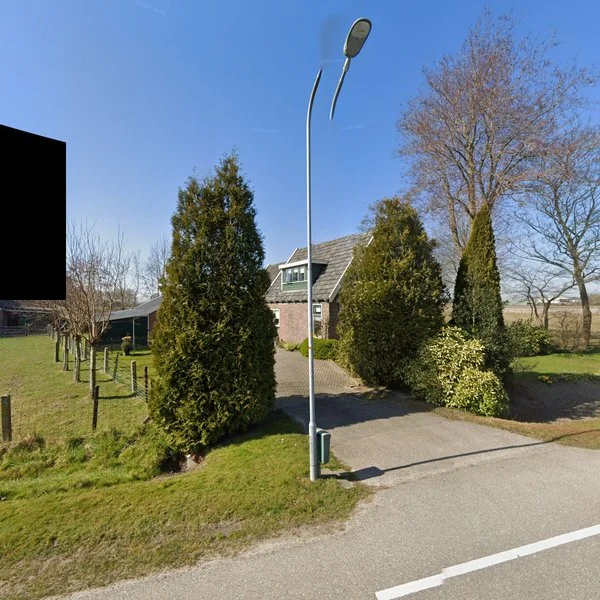 Straatbeeld van Woudmeerweg 36, 1746CD Dirkshorn